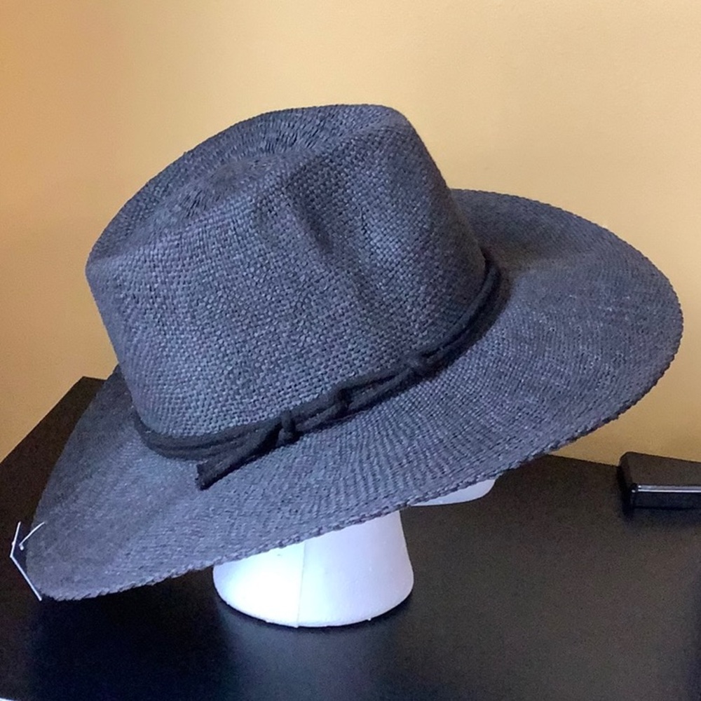 Black hat with black cord around top